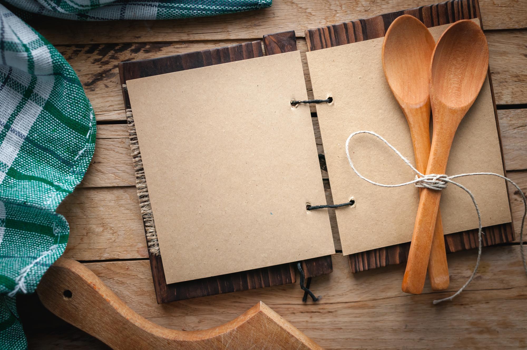 Flatlay of recipe notes and tasting spoons